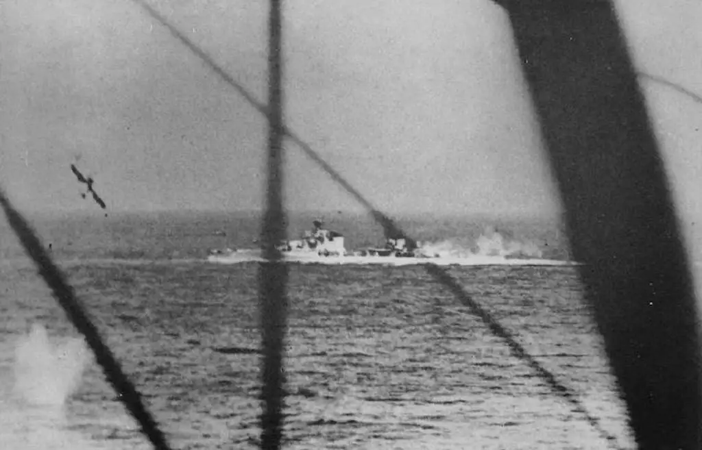 A photo of the Bolzano being attacked by Swordfish at the Battle of Cape Matapan. This image was taken from a second Swordfish that just dropped a torpedo at the bottom left of the image.