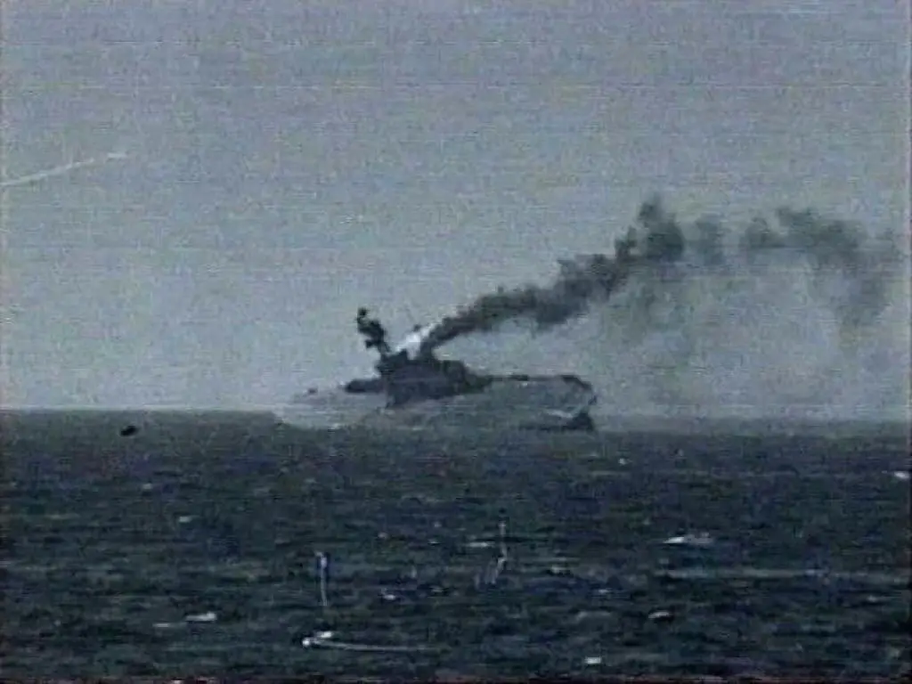 The HMS Eagle sinking after being hit by torpedoes.