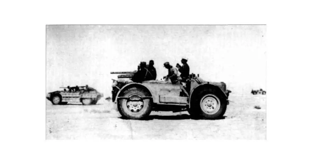 This photo clearly shows three vehicles from the original Raggruppamento Sahariano AS, the nearer is the SPA TL37 Camionetta AS mounting the 47/32 Anti-Tank Gun, the further vehicle is a AS.42 Sahariana, probably 790 B, 792 B, or 798 B as it appears to mount a 20mm and a single MG, and finally in the right distance can be seen a second AS.42 Sahariana.