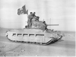 A Matilda tank with a captured Italian flag