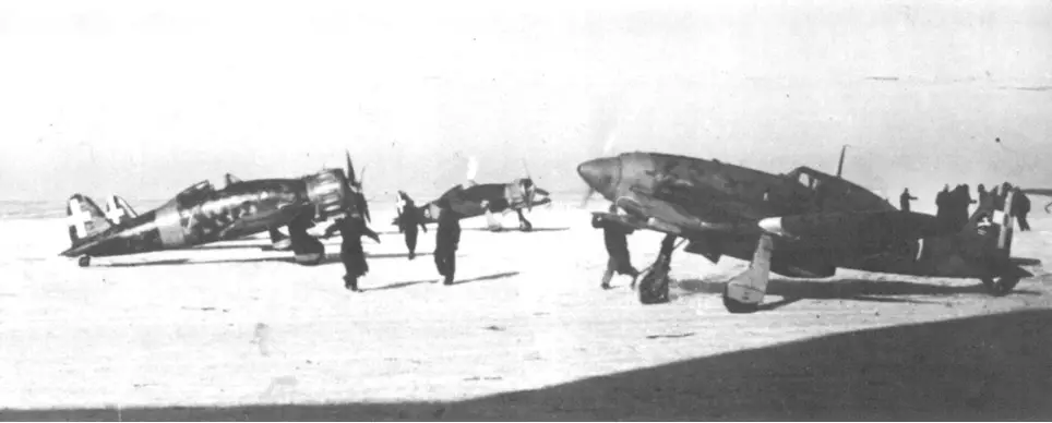 Figure 1 MC200 and MC202 fighters over an Italian airport in Russia covered by snow